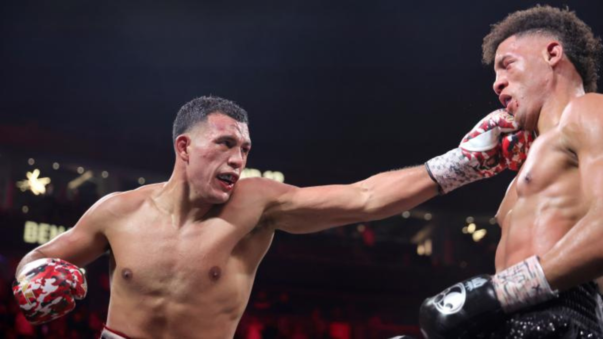 David Benavidez lands a powerful right hand on David Morrell during their light heavyweight title fight at T-Mobile Arena in Las Vegas.